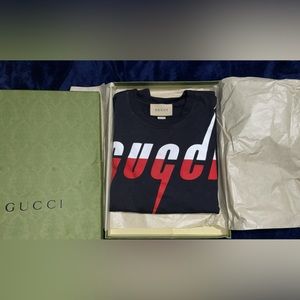 Red and black Gucci shirt ! Original, does not come with tags ,fairly used